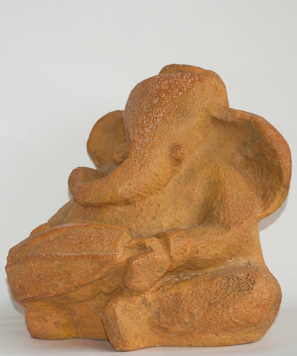 Ocher Ganesha Sculpture