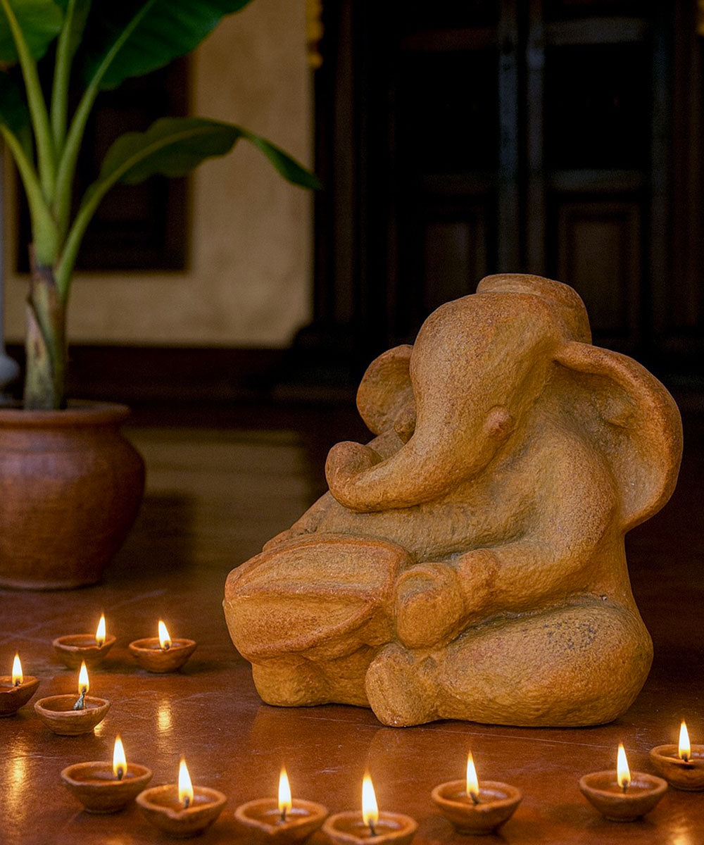 Ocher Ganesha Sculpture